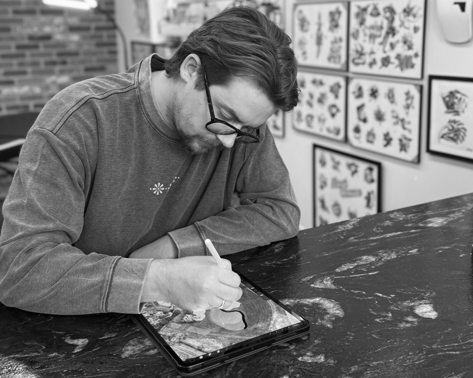 Drawing a course by hand in the studio.